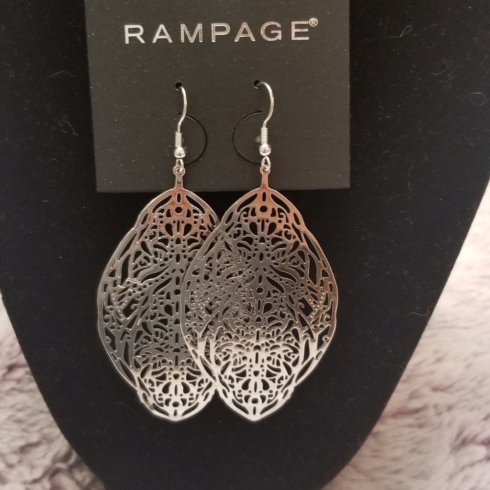 Silver dangle earrings.